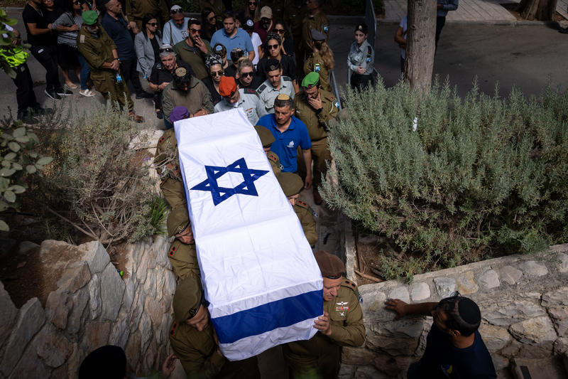 Family and friends attend the funeral of Lt. Col. (res.) Yitzhak Harush, 68, at Mt Herzl cemetery in Jerusalem. Harush was killed yesterday in an attack at the Allenby border crossing with Jordan. September 19, 2025.