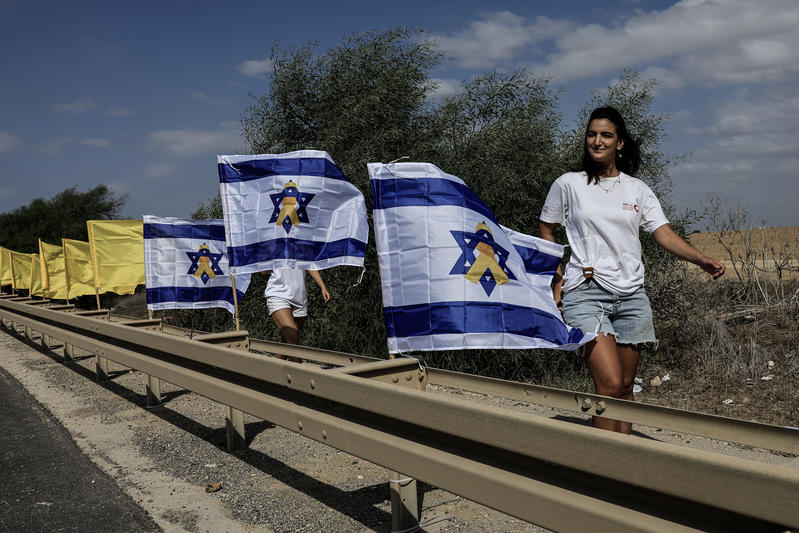The Eshkol Regional Council decorates road 232 with Israeli flags, ahead of the release of the hostages from Gaza