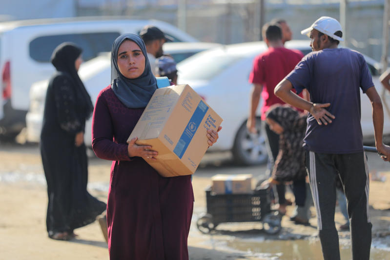 World Food Programme (WFP) provides food parcels to displaced people in Gaza City, October 23, 2025.