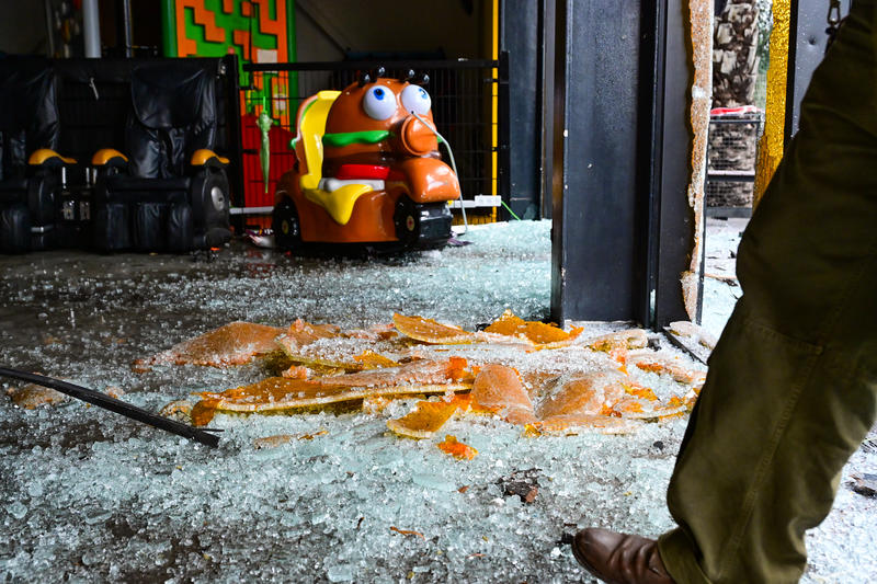 Israeli security and rescue forces inspect the damage at the scene where a missile fired from Iran toward Israel caused damage in Kiryat Ata, northern Israel, March 26, 2026.