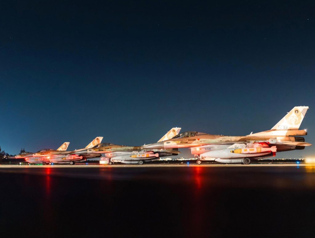 Israeli fighter jets on tarmac.