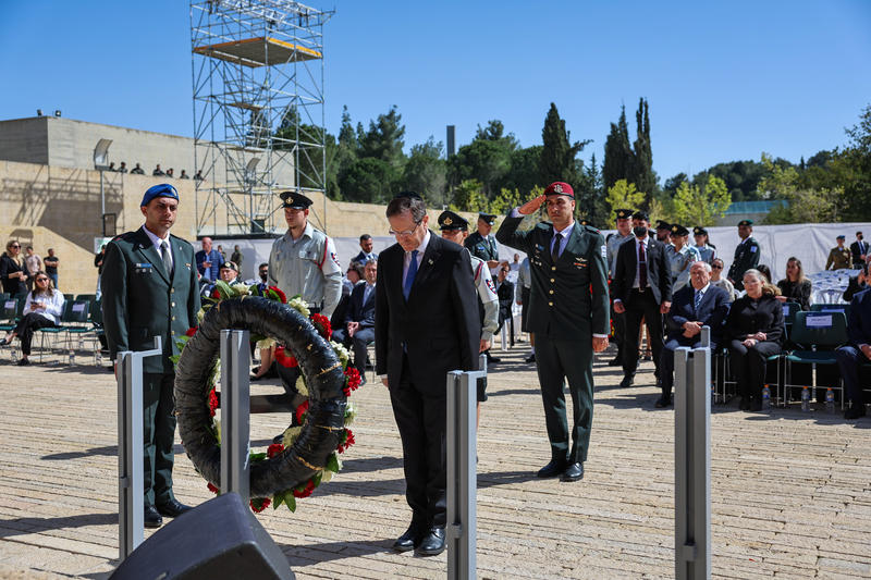 President Isaac Herzog lays a wreath during a ceremony marking Holocaust Remembrance Day at Yad Vashem in Jerusalem, April 14, 2026.