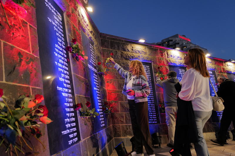 People and Israeli soldiers attend a memorial ceremony in Tiberias on the eve of Israel's Memorial Day, as the country commemorates fallen soldiers and victims of terror, April 20, 2026.