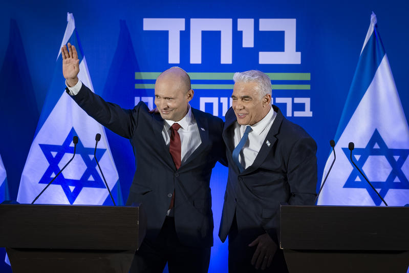 Opposition Leader and Head of the Yesh Atid party Yair Lapid and former Prime Minister Naftali Bennett speak during a press conference announcing a joint list named “Together” ahead of upcoming elections, to be led by Bennett, in Herzliya, central Israel, April 26, 2026.