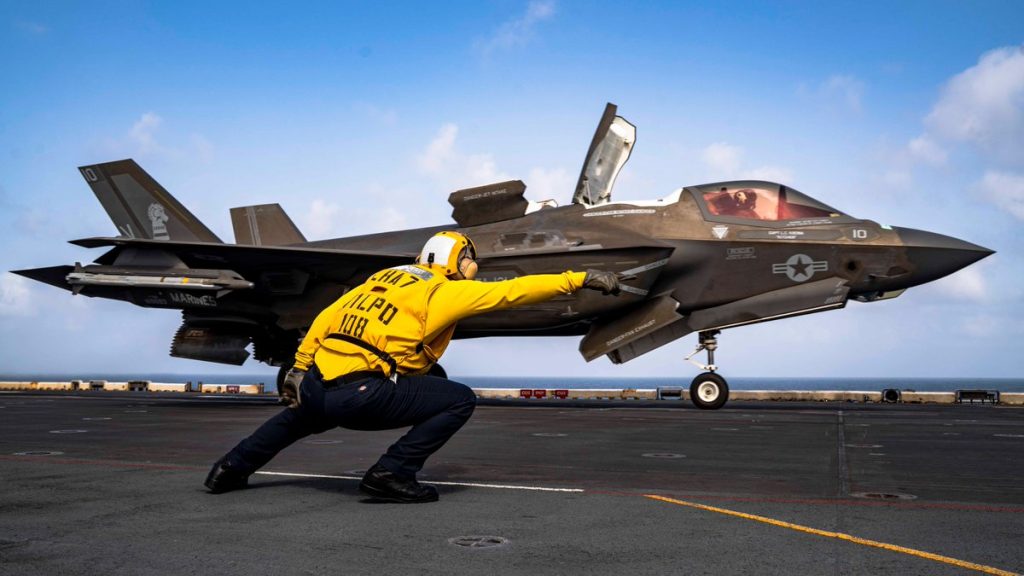US Sailors and Marines aboard USS Tripoli (LHA 7) conduct flight operations as the amphibious assault ship transits the Arabian Sea. May 23, 2026.
