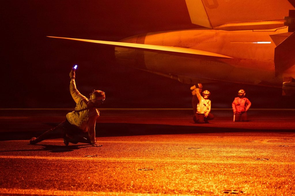 Sailors aboard USS George H.W. Bush (CVN 77) conduct night flight operations. June 7, 2026.