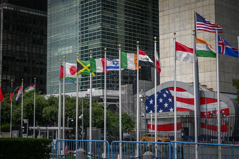 Flags of United Nations member states are seen at the entrance to the United Nations Headquarters in New York City, USA, August 20, 2026.