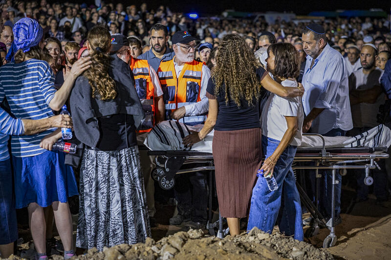 Family and friends attend the funeral of Netanel Shakron, who was murdered in a shooting attack at the Ein Raya spring near Neve Tzuf in the West Bank, at the cemetery in his community of Alei Zahav, September 21, 2026.